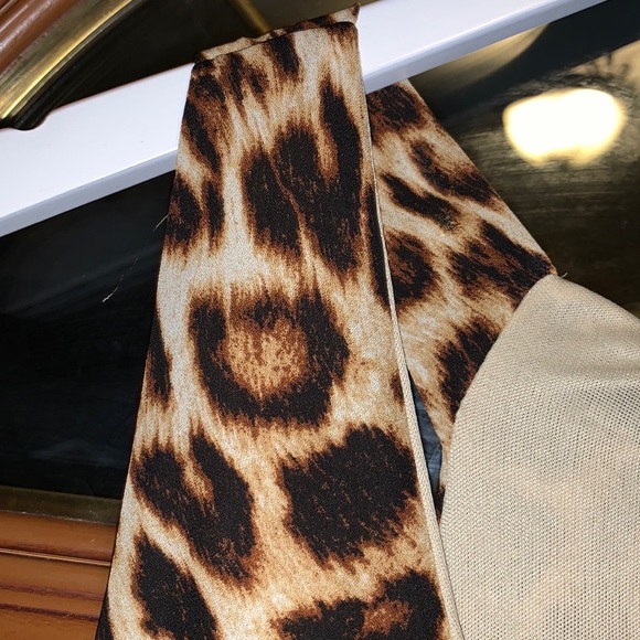 Everly Cheetah Leopard Print Flowy Peplum High Low V-Neck Sleeveless Blouse - Picture 8 of 16